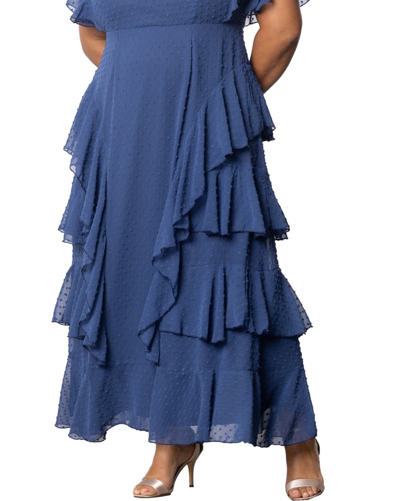 Front of a model wearing a size 4X Tour de Flounce Chiffon Evening Gown in DENIM BLUE DOT by Kiyonna. | dia_product_style_image_id:353033